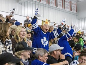 Toronto Maple Leafs fan Reed Street, 11, of West Lorne celebrates the Leafs first goal in the Kraft Hockeyville game against the Buffalo Sabres at the Joe Thornton Community Centre in St. Thomas on Wednesday, Sept. 27, 2023. (Derek Ruttan/The London Free Press)