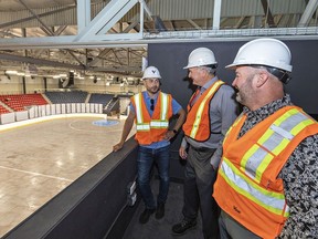 Marc Vicano (left), vice-president of Vicano Construction Ltd explains some of the renovations of the Civic Centre to Brantford Mayor Kevin Davis, and Sonny Smith (right), manager of arena operations during a tour on Tuesday September 12, 2023. The work is to be completed in time for the season opener of the OHL Jr. A Brantford Bulldogs hockey team on October 7, 2023. Brian Thompson/Brantford Expositor/Postmedia Network
