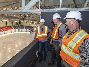 Marc Vicano (left), vice-president of Vicano Construction Ltd explains some of the renovations of the Civic Center to Brantford Mayor Kevin Davis, and Sonny Smith (right), manager of arena operations during a tour on Tuesday September 12, 2023. The work is to be completed in time for the season opener of the OHL Jr. A Brantford Bulldogs hockey team on October 7, 2023. Brian Thompson/Brantford Expositor/Postmedia Network
