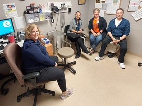 Members of the Chatham-Kent community health centers team, from left, nurse practitioner Nicole Basico, registered practical nurse Melissa Campbell, CHC executive director Sherri Saunders, and respiratory therapist William Brown, are among the 70 staff who serve the community.  (Ellwood Shreve/Chatham Daily News)