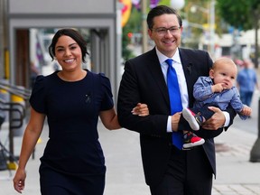 Federal Conservative leader Pierre Poilievre and his wife Anaida and son Cruz arrive at the Conservative caucus meeting in Ottawa on Monday, Sept. 12. What sort of environmental legacy will the Tory leader leave?