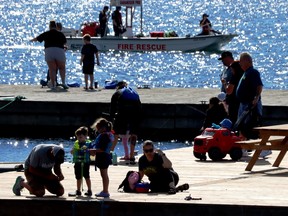 Families came out to fish and watch a fireboat demonstration at the Catching Fish with Cops event at Joel Stone Park on August 13. Families fished together off the docks at the Thousand Islands Boat Museum while other activities took place in the park. Lorraine Payette/for Postmedia Network
