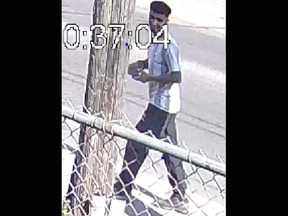 Kingston Police are looking to speak with this person after he approached children playing in the Cathedral Catholic School playground on Sept. 6, 2023. (Supplied photo)