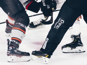 Skates on the ice, dropping the punk
