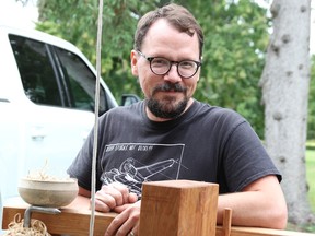 Brian Houf poses with his self-built, spring pole lathe at Art in the Park in Mike Weir Park Saturday in Bright's Grove.