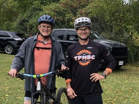 John Herbert (left) of London and Brian Pond of the Turkey Point Mountain Bike Club, get ready for the Fall Ripper, an annual trail riding event organized by the club.  The ride, held Sunday (Sept. 24) attracted more than 150 riders.