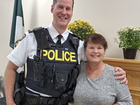 Norfolk County OPP Insp. Andrew Tait with PSB chair Kim Huffman