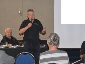 Rob Bowerman, VP of sales with Road Surface Recycling, addresses a gathering of taxpayers and three councillors at the Northbury Hotel on Thursday while brothers Mike, left, and Frank Crupi, the company’s president and vice-president, respectively, look on.
