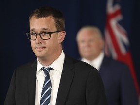 London-area MPP Monte McNaughton is shown with Premier Doug Ford behind him at Queen's Park on Wednesday, June 24, 2020. (Canadian Press)