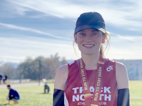 Megan Crocker poses for a photo while wearing Track North colours.