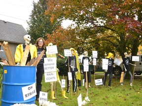 Melissa McKerlie and her boney pals, the Skeletons of Vivian Line, protested the rainy start to skeleton season Thursday and Friday. The skeletons can be seen in various Halloween and other themed displays in McKerlie’s front yard on Vivian Line 37 in Stratford from now until Oct. 31.