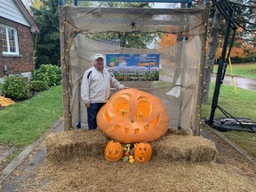 Pat Watson's 525-kilogram (1,157-pound) giant pumpkin is on display at his home at 111 Ontario Ave. in Komoka. Photograph taken on Monday, Oct. 30, 2023. (Brian Williams/The London Free Press)