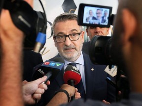 Paul Calandra, provincial Minister of Municipal Affairs and Housing, speaks to reporters on Monday, Sept. 11, 2023 in Windsor. Calandra seems to be working to rebuild trust with municipalities and the public. (DAN JANISSE/Postmedia Network)