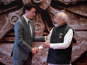 India's Prime Minister Narendra Modi greets Prime Minister Justin Trudeau ahead of the G20 Leaders' Summit in New Delhi on Sept. 9. Relations have deteriorated quickly.