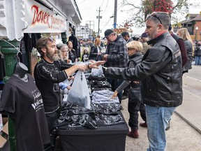 Vendors sell t-shirts at the Friday the 13th Gathering