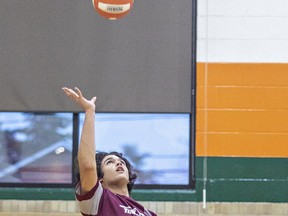 Yusuf Aburkhes of the Pauline Johnson Thunderbirds spikes the ball during an AABHN high school senior boys volleyball game against the North Park Trojans on Monday October 30, 2023 in Brantford, Ontario. Brian Thompson/Brantford Expositor/Postmedia Network