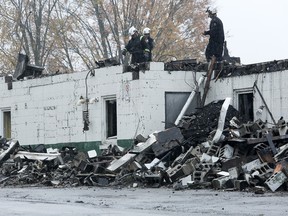Investigators with the Office of the Fire Marshal (OFM) were still working on Thursday, Oct. 26, at the scene of the fire that destroyed the Lennox Agricultural Memorial Community Centre in Napanee in the early hours of Oct. 23, 2023. The arena fire is one of three suspicious fires that have taken place in the Napanee area in recent days. Meghan Balogh/The Kingston Whig-Standard/Postmedia Network
