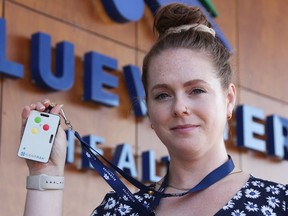 Bluewater Health communications advisor Melissa Schilz holds one of the badges in a panic-button system recently implemented at Bluewater Health, making use of a $2-million real time location system at Sarnia's hospital.