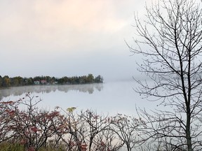 Fog blankets the landscape and water on Simon Lake in Naughton, Ont. on Tuesday October 17, 2023. John Lappa/Sudbury Star/Postmedia Network