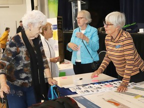 Rachel Brummage, left, chats with Jennifer Cawley Caruso, board member and co-chair of the capital campaign for L'Arche Sudbury, at the Older Adult Summit at the Caruso Club in Sudbury, Ont. on Thursday October 19, 2023