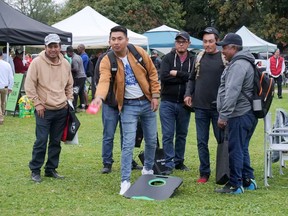 Eduardo Hernandez won a prize in the cornhole event last Thursday during the first annual Farmworkers Appreciation Day in Simcoe hosted by the Huron Farmworkers Ministry.