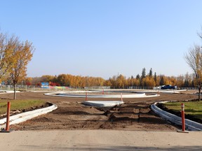 A traffic circle is being built as part of a project to give Festival Park a second road access; the road may also support a Culture and Events Centre. Construction drawings put the cost of the facility at $10 million over the original estimate of $59 million, resulting in modified plans.