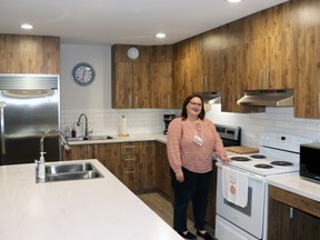 Shelter Manager Trish Lockard showed off the new kitchen at Wellspring Family Resource and Crisis Centre in Whitecourt. The shelter underwent extensive renovations worth approximately $1 million, which doubled its capacity. The centre marked its grand re-opening on Thursday afternoon.