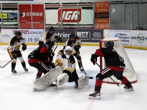 Joey Melo scored the Whitecourt Wolverines' first goal of the Oct. 20 game, on Olds Grizzlys goalie Aidan Comeau's net.