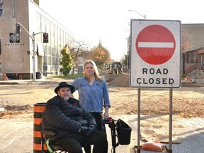 Businesses near Albert Street and Waterloo Street South in Stratford will continue to feel the pinch as that intersection, which has been closed since Oct. 12, is expected to remain closed for another two to three weeks as part of the city's ongoing Albert Street reconstruction.  Pictured are Downtown Stratford BIA general manager Jamie Pritchard and Ariana Poch, owner of Pistolnik Upholstery Service and Furniture located at the corner of Albert Street and Waterloo Street South.