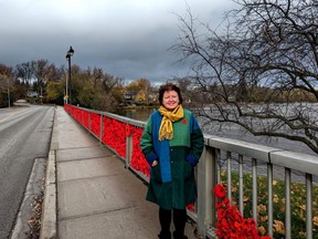 Roughly 10,000 hand-crocheted and hand-kitted poppies currently line William Hutt Bridge in Stratford. The community driven Stratford Poppy Project was led by coordinators Patty Hawkins-Russel (pictured) and Laurie Krempien-Hall.