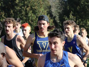 Keon Wallingford, centre, competes for the Laurentian Voyageurs at the 2023 U Sports cross-country running championships.