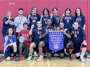 Sudbury Secondary School senior boys volleyball players celebrate their SDSSAA Division B championship.