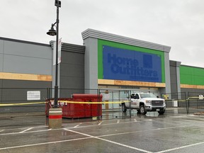 The outside of the future home of Food Basics at the Rio Can Centre on Gardiners Road is turning green as the renovations have started in Kingston, Ont. on Friday, Nov. 17, 2023. The store is expected to be open by May 2024. (Julia McKay/The Kingston Whig-Standard/Postmedia Network)