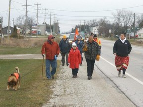 Beverley Nadjiwon, front row, second from right, leads his walk to remember the missing out of Ferndale on Sunday, November 26, 2023.