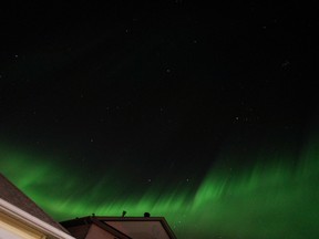 The northern lights above the Wood Buffalo neighbourhood. Vincent McDermott/Fort McMurray Today/Postmedia Network