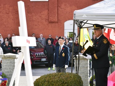 Rev. William Ney, the Mitchell Legion Padre, offers scripture and led those attending the Remembrance Day ceremony in the Lord's Prayer. ANDY BADER/MITCHELL ADVOCATE