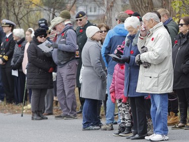A large crowd gathered at the Captain Matthew J. Dawe Memorial Branch Remembrance Day cenotaph service in W. C Warnica Memorial Park in Kingston, Ont. on Saturday, Nov. 11, 2023.