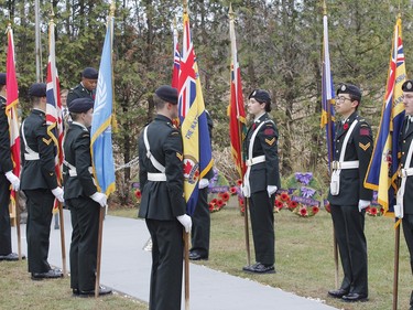 The colour party lined the pathway to the cenotaph during the Captain Matthew J. Dawe Memorial Branch Remembrance Day service in W. C Warnica Memorial Park in Kingston, Ont. on Saturday, Nov. 11, 2023.