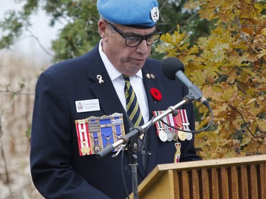 Royal Canadian Legion Branch 631 President Tom Briggs leads the crowd in the National Anthem at the start of the Captain Matthew J. Dawe Memorial Branch Remembrance Day service in W. C Warnica Memorial Park in Kingston, Ont. on Saturday, Nov. 11, 2023.