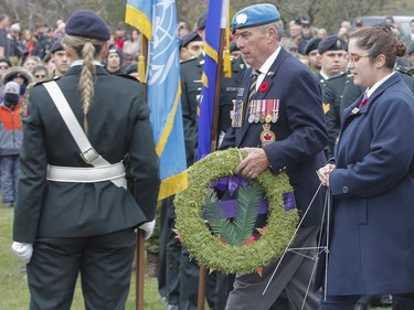 Royal Canadian Legion Branch 631 President Tom Briggs places a wreath during Captain Matthew J. Dawe Memorial Branch Remembrance Day service in W. C Warnica Memorial Park in Kingston, Ont. on Saturday, Nov. 11, 2023.