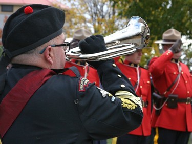 The Last Post is performed at Macdonald Memorial Park on Saturday as part of the city's civic Remembrance Day ceremony. A large gathering of military personnel, veterans, first responders, officials and residents attended the annual event on a cold but sunny morning. (Jan Murphy/The Kingston Whig-Standard/Postmedia Network)