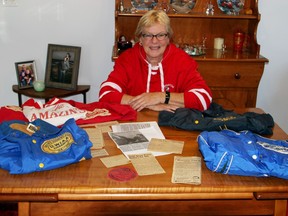 Janean Sergeant shows off some of her memorabilia