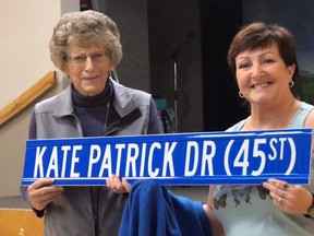 Kate Patrick, left, was surprised by Mayor Janet Jabush with the naming of part of 45th St. as Kate Patrick Drive recently. Patrick, who was Jabush's predecessor as Mayor of Mayerthorpe, celebrated her 80th birthday at the Mayerthorpe Legion.