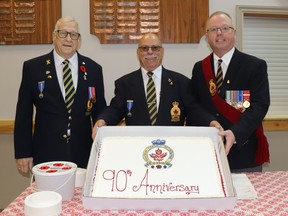 Ready with the Mayerthorpe Legion's 90th anniversary cake were (l-r) veteran Barry Fulford, President James Mack and sergeant-at-arms Owen Knott. The Legion served cake after Remembrance Day services on the morning of Nov. 11.