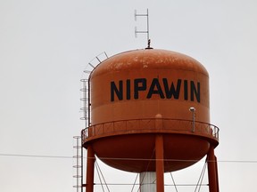 An orange-coloured water tower with name Nipawin