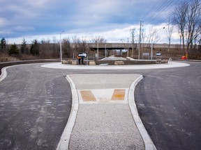 A new roundabout at Quinn Drive and Rapids Parkway could open next month, the city's construction manager says.