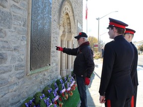 Richard Morrow of Simcoe points to his name of his grandfather, Pte. Lorance T. Morrow, who was killed at Vimy Ridge on April 8, 1917, at the Norfolk Carillon Tower War Memorial prior to Saturday's Remembrance Day service.