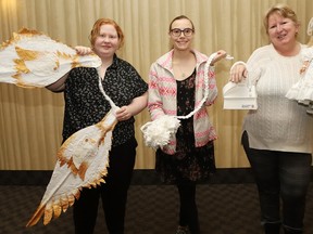 Katie-Ann McLean, left, Kaylie Voutier and Jasmine Lacroix provide a sneak peek of the fashions that were on the runway at The Gutsy Runway toilet paper fashion show at the Northbury Hotel and Conference Centre in Sudbury, Ont. on November 24, 2023, starting at 7 p.m. The fundraiser, which will support Crohn's and Colitis Canada and the Sudbury chapter, featured 16 outfits made from toilet paper and designed by local organizations and individuals.
