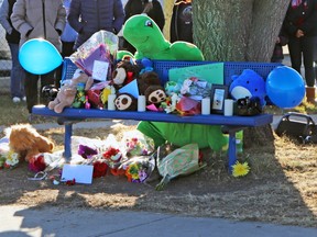 On Sunday afternoon, community members laid flowers and toys at École St. Mary School for a Vigil Celebrating Kyson, grieving Kyson, 10. The vigil followed a devastating duplex fire in Whitecourt on Thursday, Nov. 9.