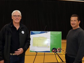 Norm Hodgson, left, and Peter Smyl, Whitecourt chief administrative officer, looked over the revised concept for the Arts, Culture and Convention Centre. The plans were presented to residents at the Allan and Jean Millar Centre on Wednesday afternoon. Hodgson was previously on the Ad Hoc Building Steering Committee but wasn't involved in the redesign and was one of many residents who attended to see the new plans.